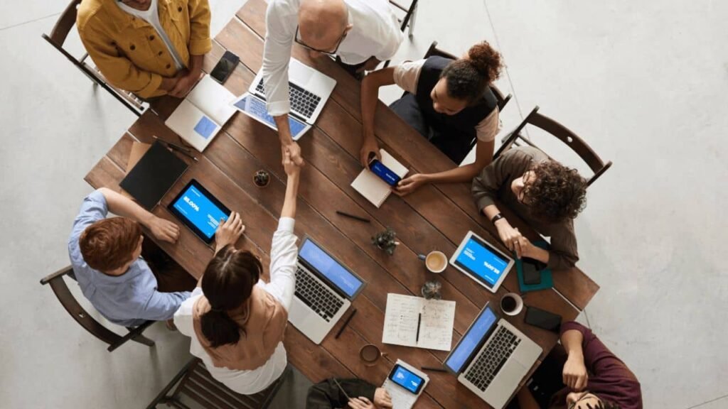 Training and Placement : Group of IT professionals engaged in a practical training session